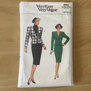 May include: A sewing pattern for a women's suit, with a black and white checked jacket and a black skirt, and a green jacket and skirt. The pattern is from Very Easy Very Vogue and is size 8-10-12.