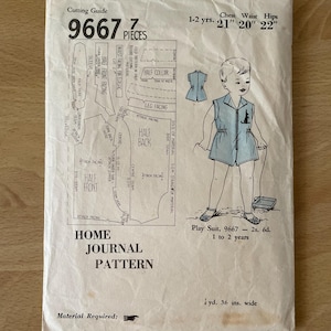 May include: A vintage sewing pattern for a child's play suit. The pattern is for sizes 1 to 2 years and includes 7 pieces. The pattern is from Home Journal and is numbered 9667. The pattern includes instructions for cutting and sewing the suit. The pattern is for a play suit with a half collar, short sleeves, and shorts. The pattern is printed on a white background with black text and illustrations.