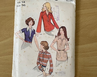 May include: A vintage sewing pattern for a women's blouse. The pattern is for sizes 14 and 36 bust. The pattern is designed for knit fabrics only and includes instructions for making a blouse with a collar, long sleeves, and a button-up front. The pattern is from Butterick and is number 6708.
