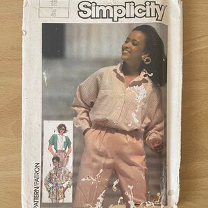 Simplicity 7324 vintage 80s women’s loose shirt with panels, dolman sleeves with cuffs, collar and neck band and side slits sewing pattern