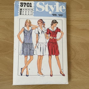 Style 3701 vintage 80s dress with dropped gathered skirt, puff sleeves and shawl collar with optional frill sewing pattern