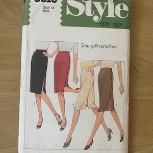 May include: A sewing pattern for a skirt with side splits. The pattern is for size 14 and is called "Style 3010". The pattern shows four different variations of the skirt, each with a different color and fabric.
