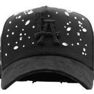 May include: Black baseball cap featuring the letters "LA" embroidered on the front. The cap is adorned with white and silver embellishments. The brim is curved, and the cap has a classic six-panel design.