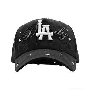 May include: Black baseball cap with the text "LA dy" in white and silver. The cap has a paisley pattern and star-shaped embellishments. The curved peak and structured crown give it a classic baseball cap appearance.