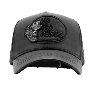 May include: Black baseball cap with a curved peak and mesh back. The cap features a leather patch with a fish graphic and the text "YO NO PESCO" in raised lettering. The cap is a dark grey colour.