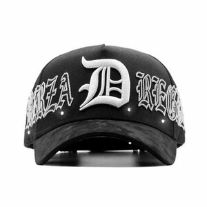 May include: Black baseball cap featuring white embroidered text and a large white letter "D". The text "FORZA DREGS" is embroidered on the cap. The cap has a curved peak and a structured crown.