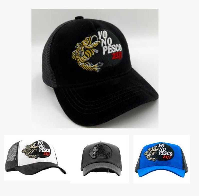 May include: Black baseball cap with a mesh back and a curved peak. The cap has an embroidered patch with a fish design and the text "YO NO PESCO 23/7". Other caps in white, grey, and blue are also shown.