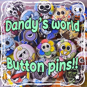 May include: A collection of colorful button pins with various cartoon character designs. The pins feature a variety of colors, including blue, yellow, pink, and green. The text "Dandy's world Button pins!!" is displayed across the image in a green font.