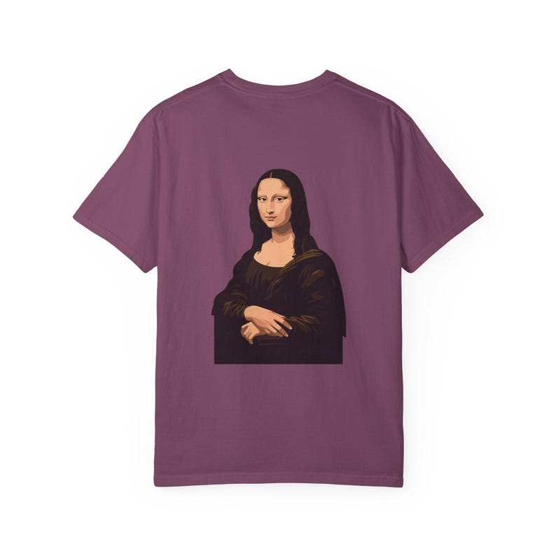 The back of a dark red t-shirt shows a graphic of the Mona Lisa portrait.