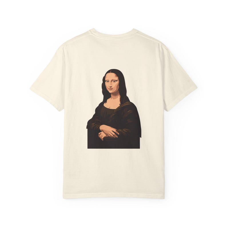 The back of a cream-colored t-shirt features a graphic of the Mona Lisa portrait.