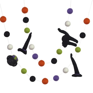May include: A Halloween garland with black, white, orange, green, and purple felt balls. The garland also features felt witch hats and a black cat.