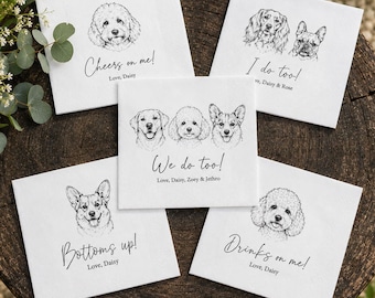 May include: Five white square paper napkins featuring black line-art illustrations of various dog breeds. Each napkin includes custom text such as Cheers on me!, I do too!, We do too!, Bottoms up!, and Drinks on me!, along with names like Daisy, Rose, Zoey, and Jethro.