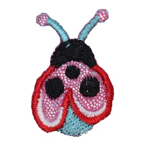 May include: A pink and red ladybug with black spots and blue antennae. The ladybug is embroidered with glitter.