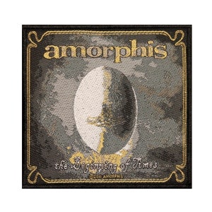 May include: A black and gold embroidered patch with the band name "Amorphis" and the album title "The Beginning of Times" in a stylized font. The patch features a white and gray egg-shaped design with a sword inside.