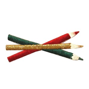 May include: Three embroidered pencils, one red, one green and one gold, are crossed over each other. The pencils are all the same size and have a pointed tip.