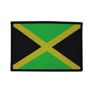 May include: A black, green, and yellow embroidered patch featuring the flag of Jamaica.