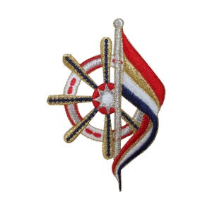 May include: A gold and silver embroidered patch with a red, white, and blue flag and a ship's wheel.