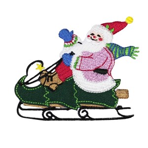 May include: Embroidered iron-on patch featuring Santa Claus and a snowman riding on a green sled with a yellow star. The sled has black runners and a brown wooden base.