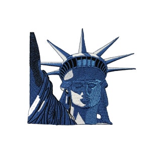 May include: Blue embroidered patch of the Statue of Liberty with a white crown and rays.
