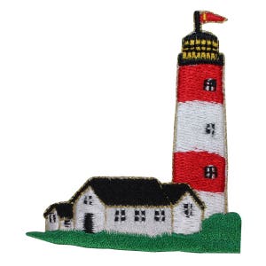 May include: Embroidered patch of a red and white striped lighthouse with a black roof and a small white building with a black roof in front of it. The lighthouse has a black flag with a red stripe on top. The building has four windows and a door. The scene is set on a green grassy area.
