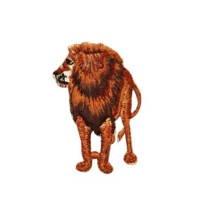 May include: Embroidered iron-on patch of a brown lion standing with its head turned to the side.