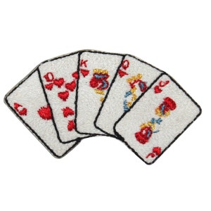 May include: Five playing cards, all hearts, showing the 10, Jack, Queen, King, and Ace. The cards are white with red and gold embroidery.