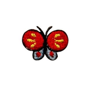 May include: A small red butterfly with yellow markings on its wings. The butterfly is embroidered and has a blue center.