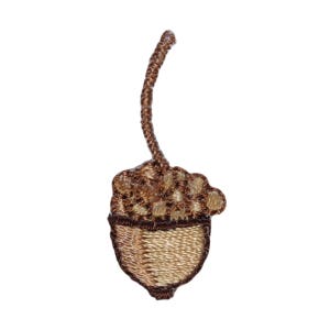May include: A brown and beige embroidered acorn with a stem.