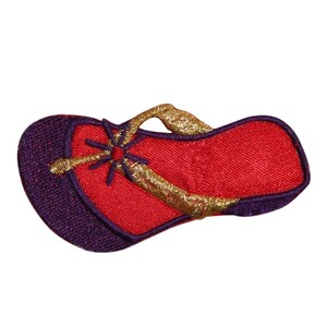 May include: Red and purple embroidered iron-on patch of a flip-flop sandal.