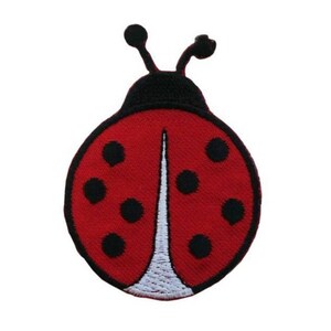 May include: Red ladybug with black spots and white wings. The ladybug is embroidered on a fabric patch.