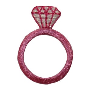 May include: Pink embroidered iron-on patch of a ring with a diamond.