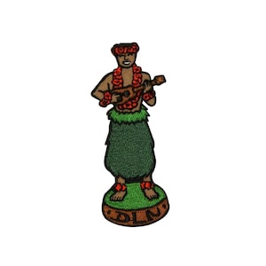 May include: An embroidered patch of a Hawaiian ukulele player wearing a red flower lei and a green grass skirt. The patch is on a brown background with the word "OLIN" written on it.