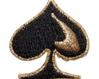 May include: Black and gold embroidered patch shaped like a spade playing card.