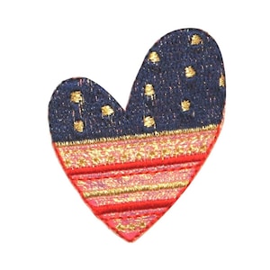 May include: A red, white, and blue heart-shaped patch with gold stars and stripes.