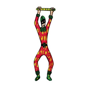 May include: Embroidered patch of a person in a red and yellow patterned jumpsuit holding a green and yellow stick above their head.
