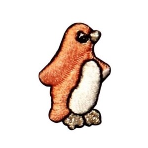 May include: An orange and white embroidered penguin applique patch. The penguin is standing upright with its wings at its sides.
