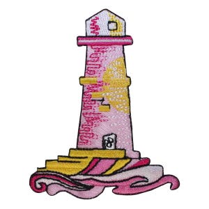 May include: Pink and yellow embroidered lighthouse patch with waves at the base.