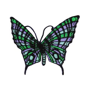 May include: A purple and green embroidered butterfly patch. The butterfly has a black body and wings with a detailed pattern.