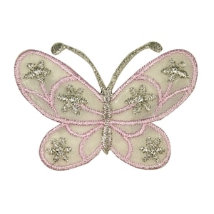 May include: A pink and white butterfly applique with silver glitter accents. The butterfly has a delicate, embroidered design.