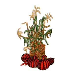 May include: An embroidered patch depicting a brown and green corn stalk with red pumpkins at the base. The patch is ideal for adding a touch of autumn to your crafts.