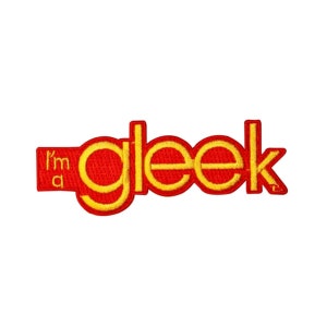 May include: Red and yellow embroidered patch with the text "I'm a gleek"