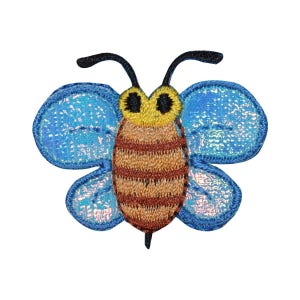May include: A blue and brown embroidered bee with iridescent wings. The bee has a yellow head and black eyes.