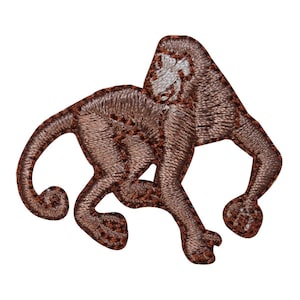 May include: Brown embroidered iron-on patch of a monkey in a running pose.