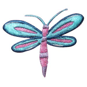 May include: A blue and pink embroidered dragonfly with a glittery finish. The dragonfly has a long, pointed tail and two pairs of wings.