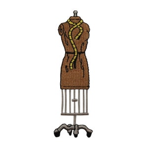 May include: A brown fabric dress form with a yellow fabric sash, standing on a metal stand with a tripod base.