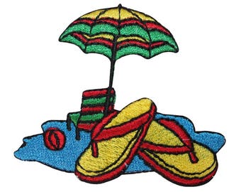 May include: Embroidered patch featuring a beach scene with a yellow and green striped umbrella, a beach chair, a red and yellow beach ball, and two yellow flip flops.