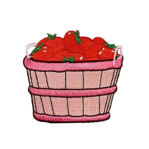 May include: A pink wooden basket filled with red tomatoes. The basket has a white handle.