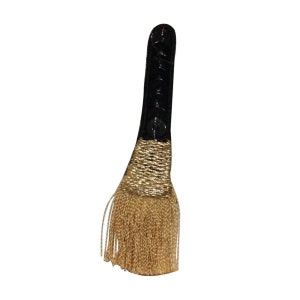 May include: A black and gold tassel with a black leather strap. The tassel is made of gold thread and has a fringe at the bottom.