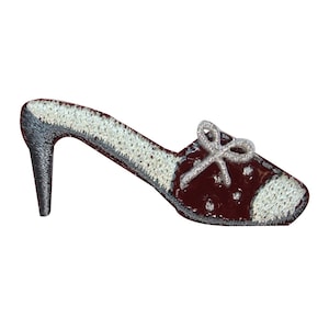May include: An embroidered iron-on patch of a red high-heeled shoe with a white bow and white trim.