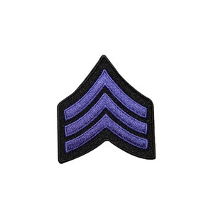 May include: Purple embroidered chevron patch with three stripes on a black background.
